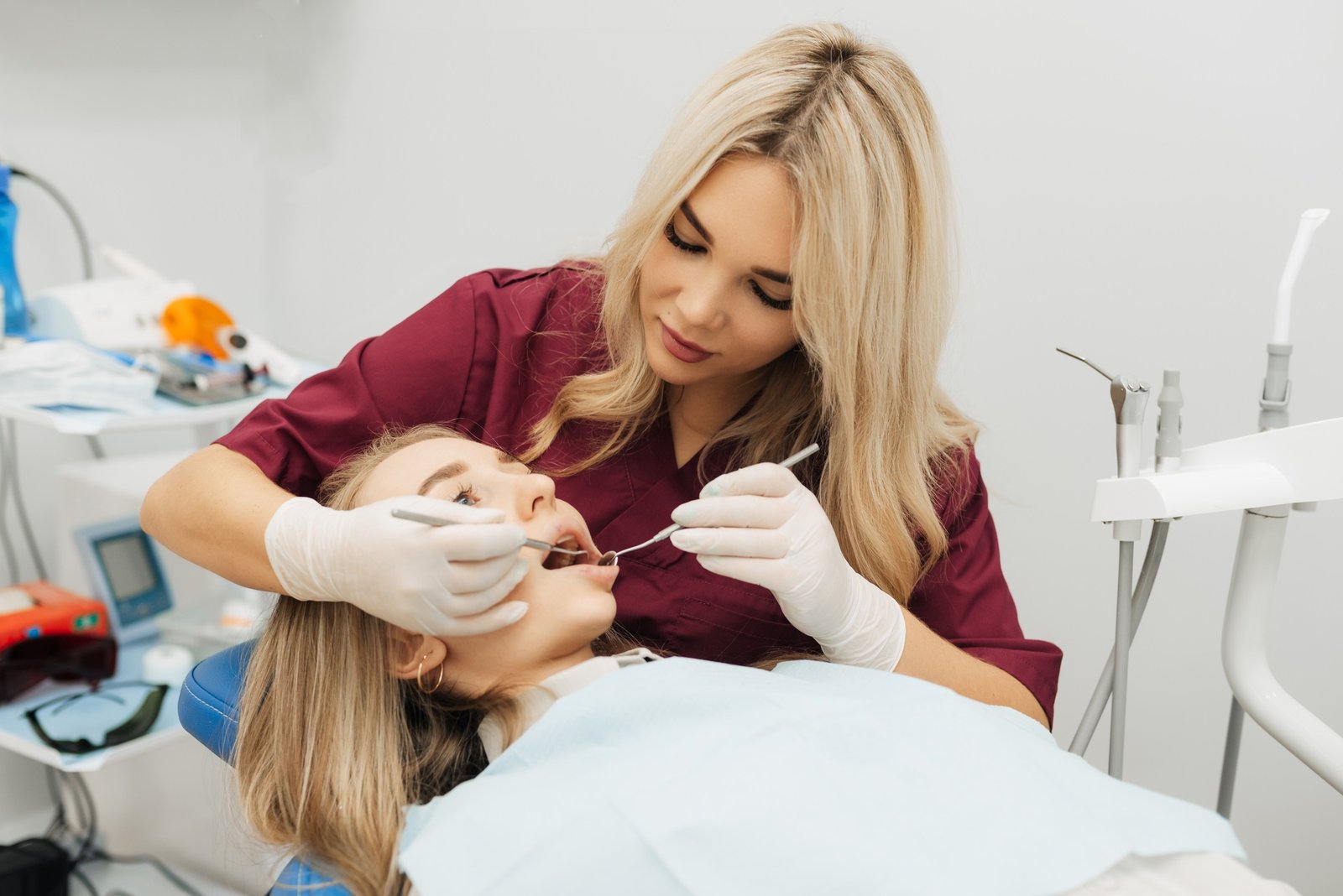 Dentist examining a patient's teeth in the dentist.